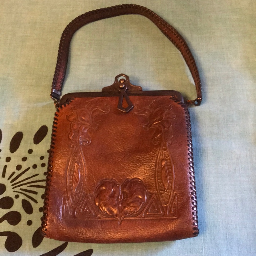 VTG Hand tooled leather stitched metal clasp bag